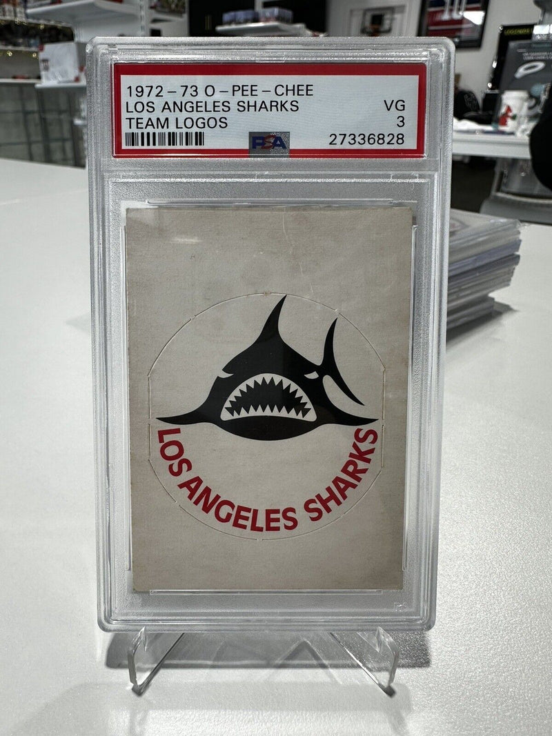 1972-73 O-Pee-Chee Los Angeles Sharks Team Logo PSA 3 - Cartes Sportives Rive Sud